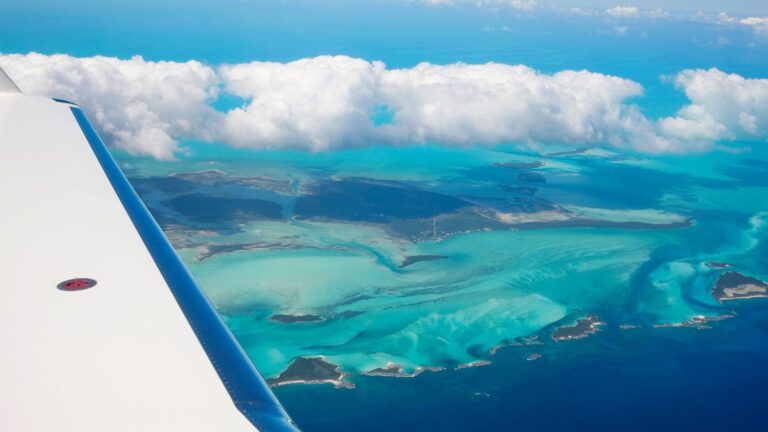 The Exuma Cays seen from the wing of a Makers Air flight