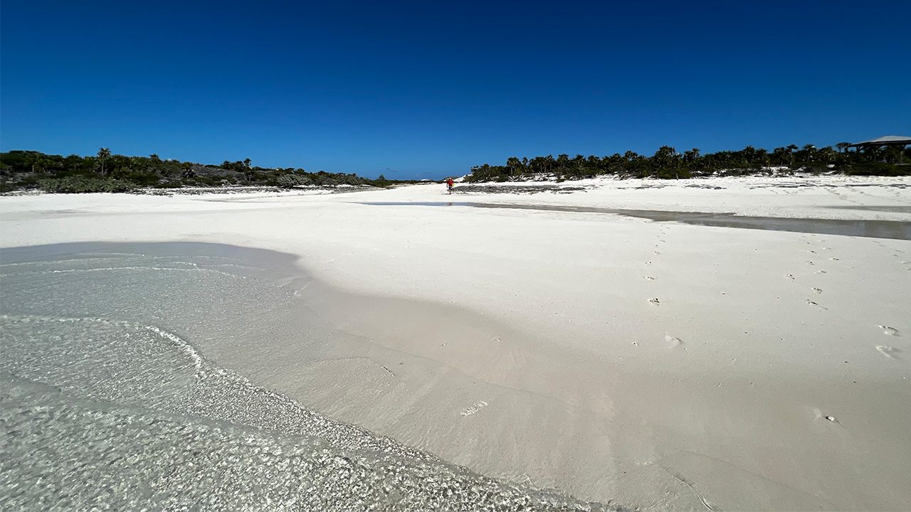 White sandbar and calm turquoise water in the Exumas