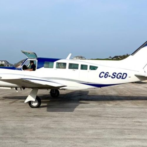 Charter plane on the airstrip with its door open